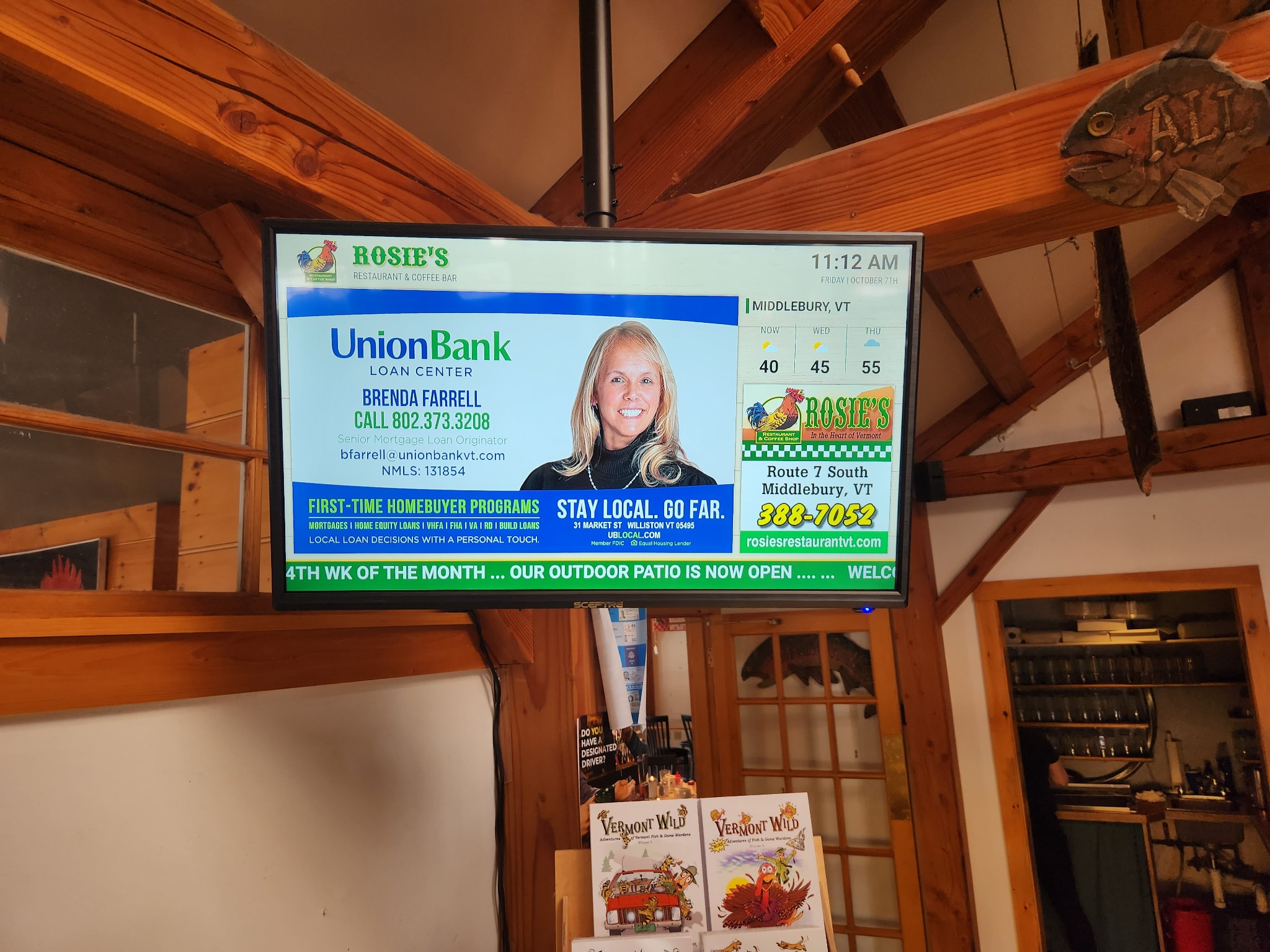 Landscape digital advertising screen inside Rosie's Restaurant in Middlebury